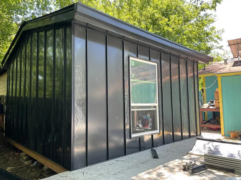 Black standing seam metal wall panels for Roof Inspection in Ingleside