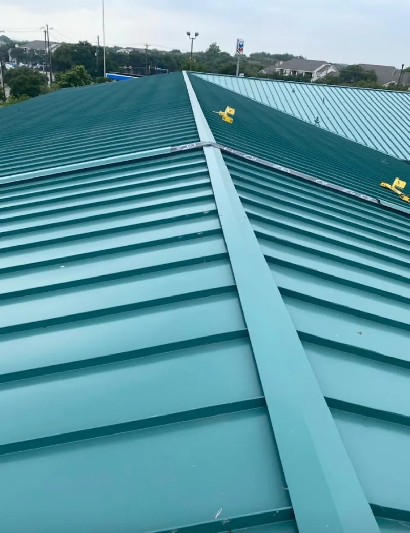 Green commercial metal roof ridge and valley for Metal Roof Repair in Ingleside